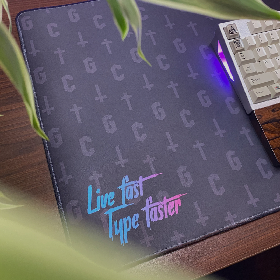 Live Fast, Type Faster Deskmat